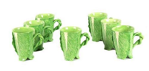 A Set of Seven Dodie Thayer Lettuce Ware Mugs Height 5 1/4 inches.