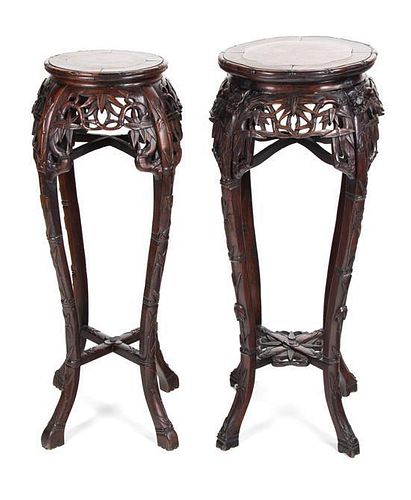 Two Chinese Export Carved Rosewood Pedestals Height of taller 37 inches.