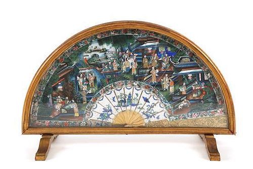 A Chinese Gilt Metal Mounted Paper Folding Fan Height 12 3/4 x length 21 1/2 inches.