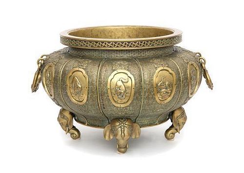 A Chinese Brass Jardinière Height 13 x diameter 19 inches.