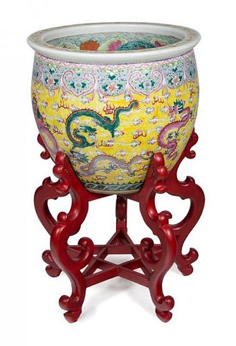 A Chinese Export Porcelain Jardinière Jardinière height 19 x diameter 21 1/2 inches, stand height 23 1/2 inches.