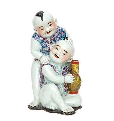 A Chinese Polychromed Ceramic Figural Group Height 15 inches.