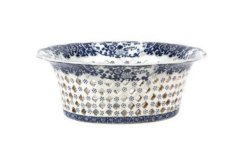 A Chinese Export Blue and White Reticulated Basket Height 5 5/8 x width 12 1/2 inches.