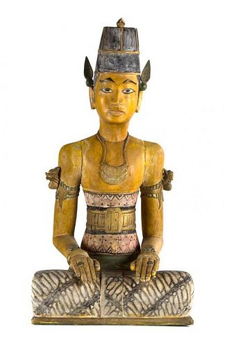 A Pair of Balinese Carved and Painted Wood Figures Height of tallest 29 inches.