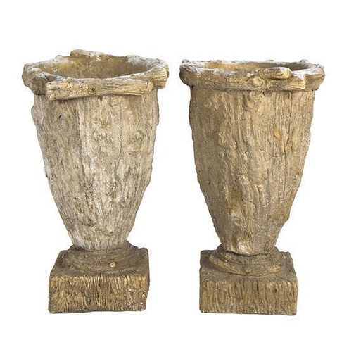 A Pair of Composition Garden Urns Height 16 inches.
