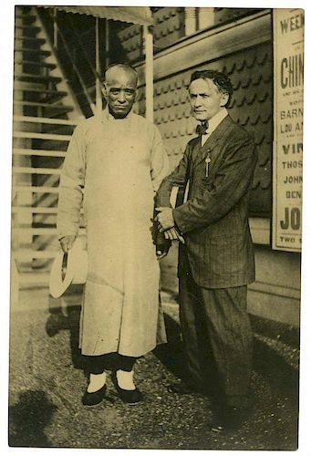 Houdini, Harry. Full Length Photograph of Houdini and Ching Ling Foo. [Brighton Beach], 1913. Report
