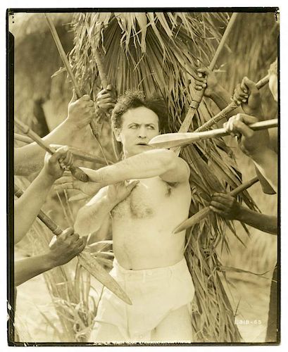 Houdini, Harry. Movie Still of Houdini Attacked by Natives in Terror Island. Los Angeles, [1920]. Se