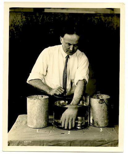 Houdini, Harry. Photograph of Houdini Molding сSpirit Hands.о New York, ca. 1924. The famous magicia