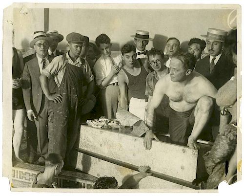 Houdini, Harry. Houdini Shelton Hotel Pool Stunt Photo. N.p., ca. 1922. A crowd looks on as Houdini