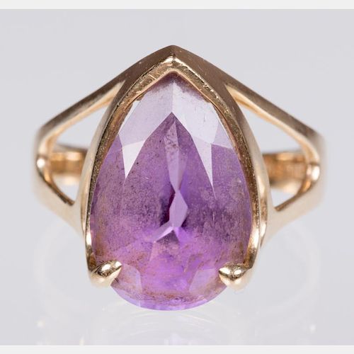 A 14kt. Yellow Gold and Amethyst Ring.