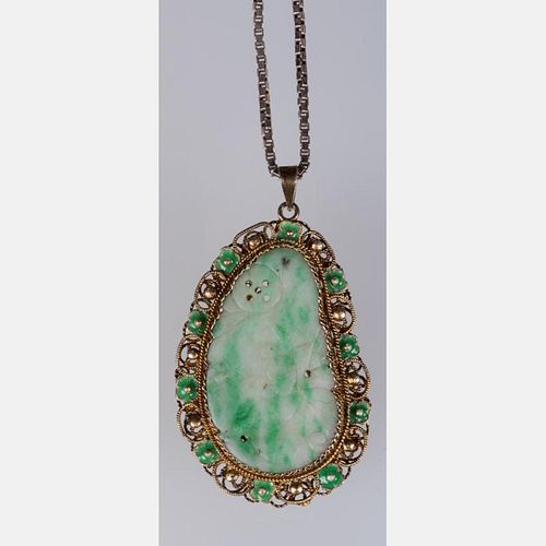 A Gold-Over Silver and Green Jade Pendant,