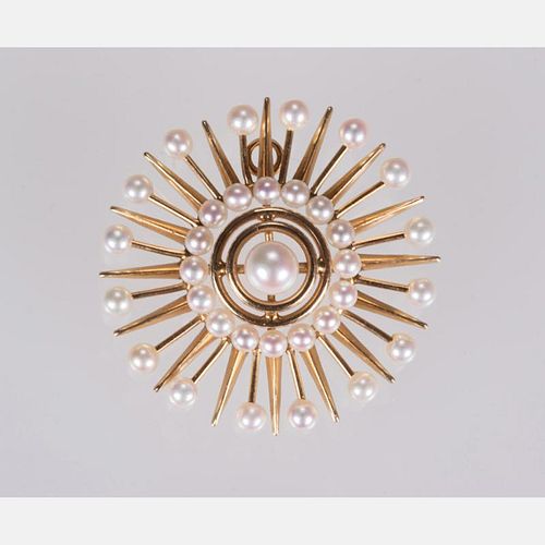 A 14kt. Yellow Gold and Akoya Cultured Pearl Star Burst Brooch,