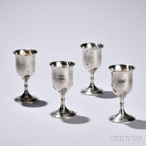 Four American Sterling Silver Goblets, 20th century, Mermond, Jaccard & King, retailer, of typical form with monogrammed bell-form bowl