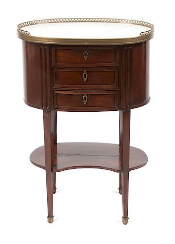 * A French Brass Mounted Mahogany Table en Chiffonniere Height 28 1/4 x width 19 x depth 13 inches.