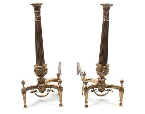 A Pair of Neoclassical Brass Andirons Height 28 1/2 inches.