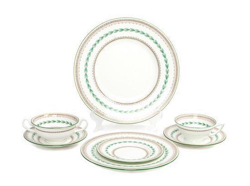 * A Minton Porcelain Dinner Service for Twelve Diameter of first 10 5/8 inches.
