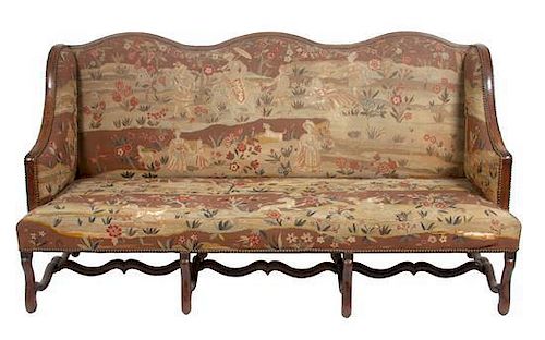 * A Victorian Tapestry Upholstered Wing-Back Settee Height 40 x width 77 x depth 34 inches.