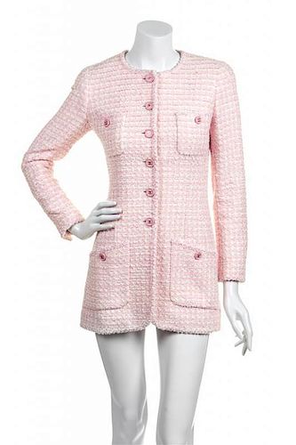 A Chanel Pink and White Tweed Jacket, Size 34. sold at auction on 7th April