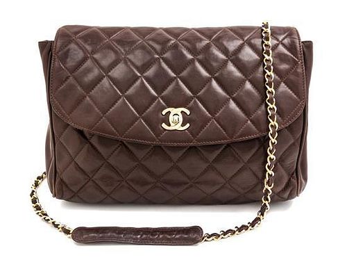 A Chanel Brown Quilted Leather Flap Handbag, 11" x 10" x 3".
