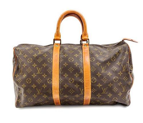A Louis Vuitton Monogram Canvas Small Duffle Bag, 18.5" x 12" x 8".