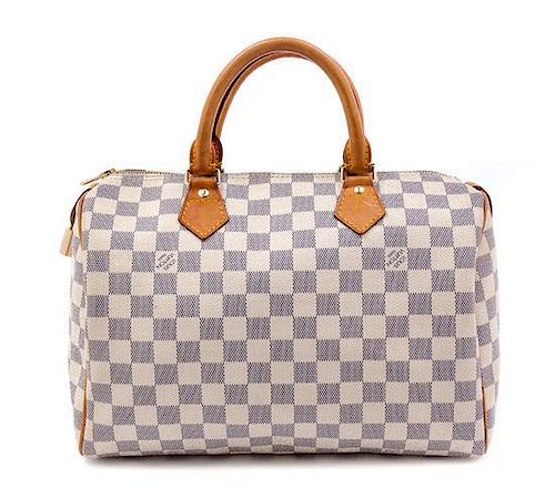 A Louis Vuitton Speedy 30 Handbag, 11" x 9.5" x 7".