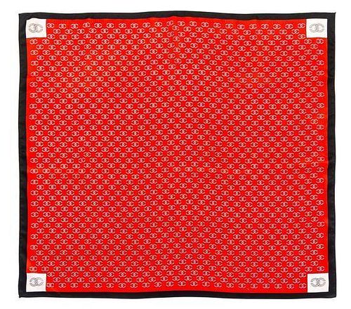 A Chanel Red Silk Scarf, 30" x 30".