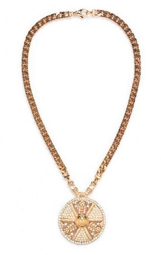 A Gianni Versace Rose Goldtone Pendant Necklace, 22" length, 2.5" pendant diameter.