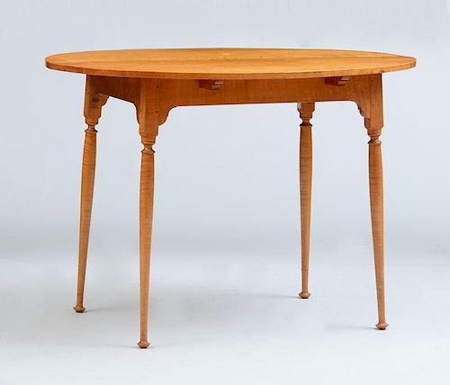 REPRODUCTION QUEEN ANNE FIGURED MAPLE TEA TABLE