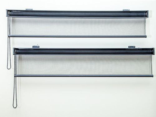 TWO RETRACTABLE FIRE SCREENS