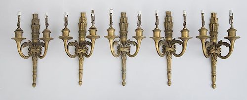 SET OF FIVE LOUIS XVI STYLE GILT-BRASS TWO-LIGHT WALL SCONCES, BY J. E. CALDWELL & CO.