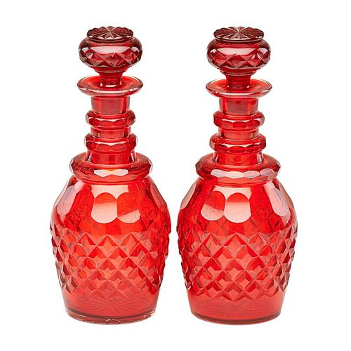 PAIR OF RUBY GLASS DECANTERS