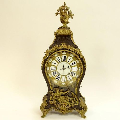 French 18th Century Bracket Clock. Figural bronze mounted, inlaid, porcelain dial, silk suspension.