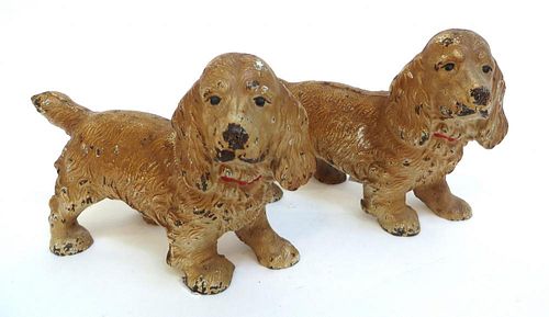 Two Identically Painted Cocker Spaniel Dogs