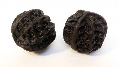 Two Carved Walnuts