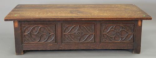 Gothic style oak lift top chest. ht. 19 in.; top: 31" x 65".