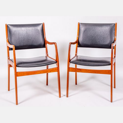 A Pair of Danish Modern Teak Arm Chairs