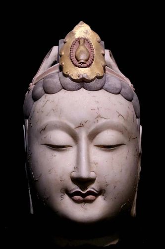 A Carved HanBaiYu Buddha Head