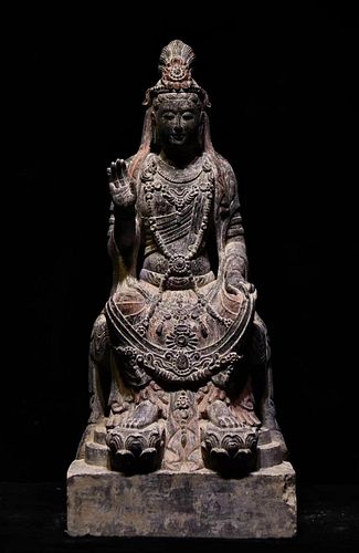 A Carved Stone Seated Guanyin Statue