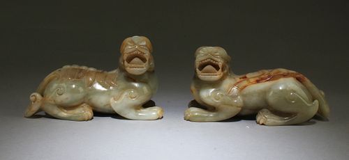A Pair of Carved Jade Qilin Figurines