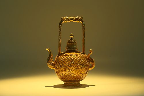 A Gilt Bronze Winepot