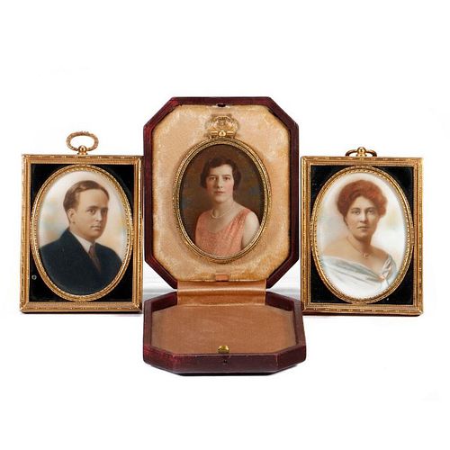 PAIR OF OPALOTYPE MILK GLASS PORTRAITS, with another.