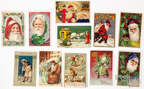 Eleven embossed Christmas postcards
