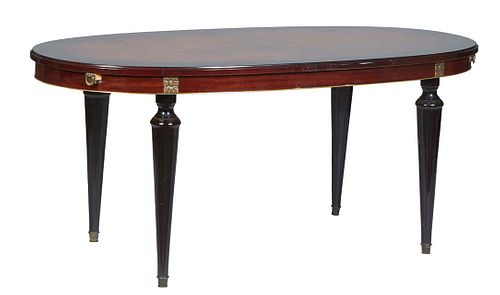 French Ormolu Mounted Louis XVI Style Carved Cherry Dining Table, 20th c., the ogee edge oval top over a wide skirt, on turned tapered reeded cylindri