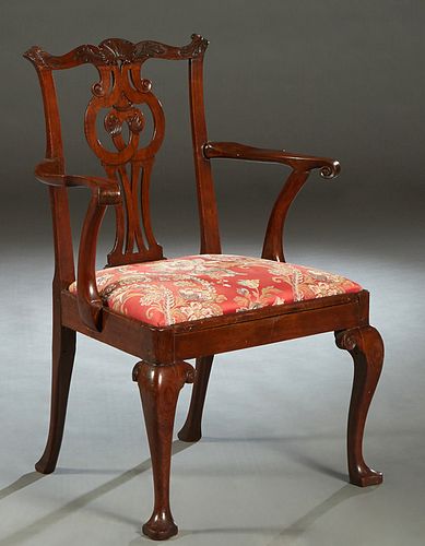 English Carved Mahogany Hepplewhite Style Armchair, c. 1800, the shell carved arched back over a pierced splat, to curved arms and a trapezoidal slip 