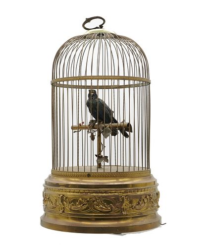 French automaton singing cage French automaton singing cage, featuring a hand feathered automaton singing bird centered on a perch in a brass cage, ci