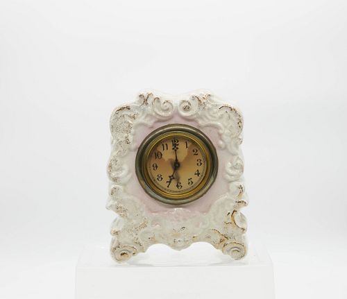 20th Century Porcelain table clock 20th century American polychrome paper faced Porcelain table clock, with a circular movement.
Not tested, (as is) 