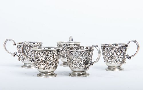 5 Sterling silver cup holders American 20th century pierced demitasse sterling silver cup holders.5 cup holders. 4.45 ozt