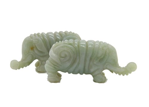 Pair of 19th century Chinese carved elephants Pair of 19th Century Chinese green jade carved elephants.

Size: 1 1/2" H x 2 1/2"W 