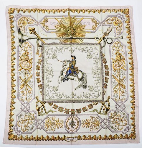 Hermes silk scarf "Lvdovicvs Magnvs" Hermes silk scarf "Lvdovicvs Magnvs" gold on pink by Francoise De La Perriere 
Approx 34in x 34in
Made in Franc