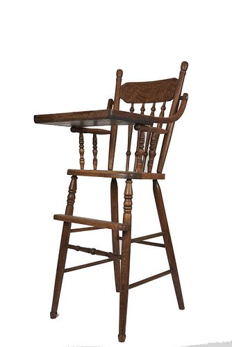 Late 19th century oak childâ€™s high chair Late 19th century oak childâ€™s high chair the oak childâ€™s high chair is raised on turned legs and retain